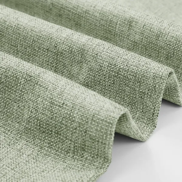 Close-up of light green linen-look fabric texture.
