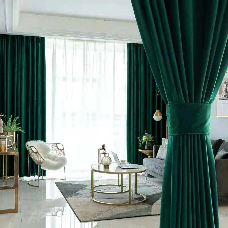 Emerald green velvet soundproof curtains and sheer sheers.